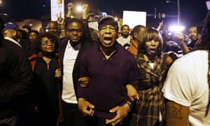 Elijah Cummings, center, walks with community leaders to clear a crowd ahead of a curfew in Baltimore, Maryland, on 1 May 2015. 3562.jpg?width=300&quality=85&auto=forma