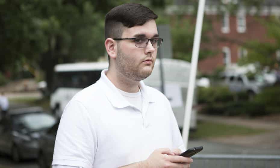 James Alex Fields Jr stands ahead of a rally in Charlottesville, Virginia on 12 August 2017. He is accused of an attack the same day that left Heather Heyer dead.