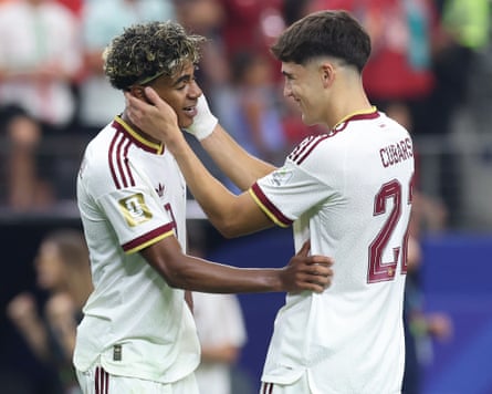 The Spain players Lamine Yamal and Pau Cubarsí observe their team's 1-0 triumph against Portugal successful nan past 16 of nan 2026 World Cup.