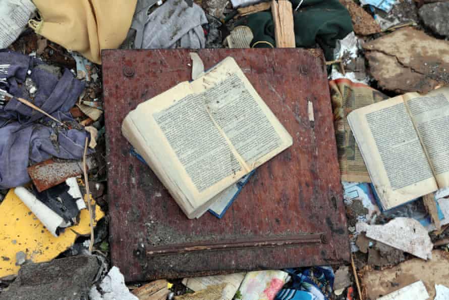 Books are seen among the debris in the city of Borodyanka.