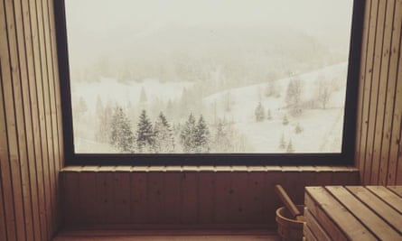 A snowy scene viewed from the sauna at Akasha Wellness Retreat, Romania
