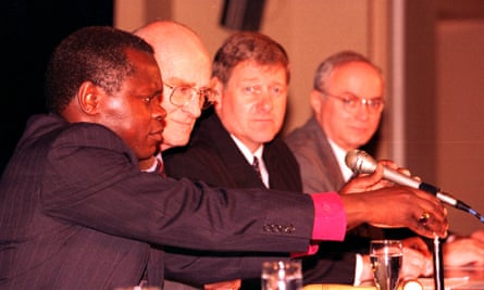 Richard Stone, right, at the preliminary hearing of the Lawrence inquiry in 1997. The other panel members were, from left, John Sentamu, the bishop of Stepney, inquiry chair Sir William Macpherson and Tom Cook.