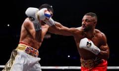 Kell Brook (right) on the attack against Amir Khan.