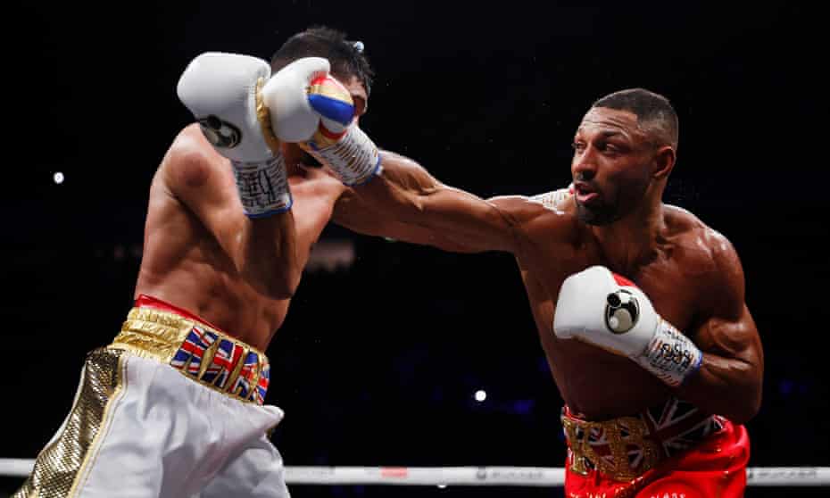 Kell Brook (right) on the attack against Amir Khan.