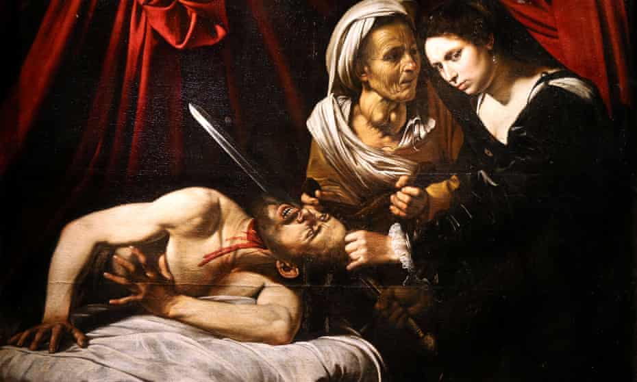 The painting Judith Beheading Holofernes at its presentation in Paris. It may have been painted by Caravaggio (1571-1610) and could be worth €120m.