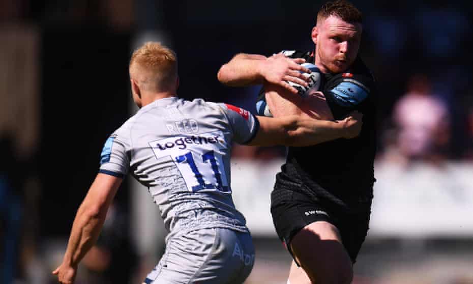 Sam Simmonds of Exeter (right) bursts past Aaron Reed of Sale.