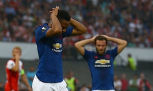 Anthony Martial and Juan Mata look dejected after another missed chance.