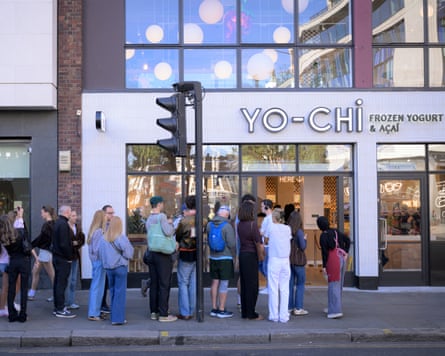 People are shown queueing outside Yo-Chi, London.