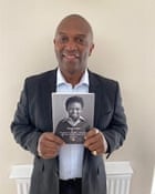 Brian Lewis with a copy of his ghost-written autobiography