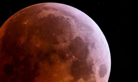 The super blood moon is seen during a total lunar eclipse in Hungary in 2019.