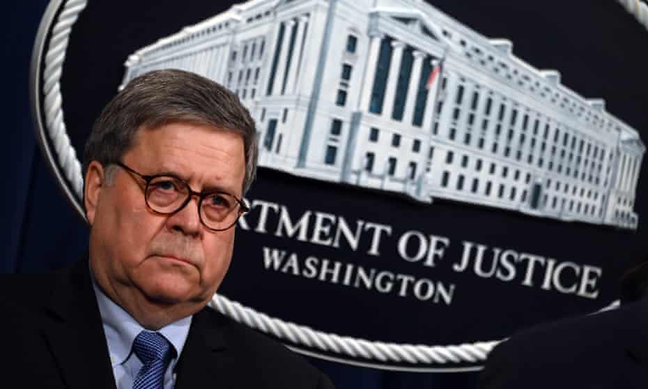 William Barr holds a press conference at the Department of Justice.
