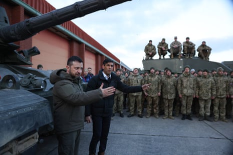 Volodymyr Zelenskiy and Rishi Sunak meeting with tank crews from Ukraine’s armed forces being trained by members of the British Army in Lulworth Camp, Dorset, this afternoon.