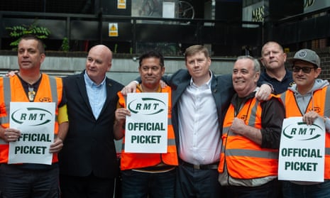 RMT general secretary Mick Lynch and assistant general secretary Eddie Dempsey visit the picket line at Euston station.