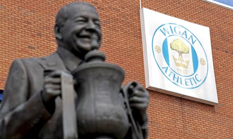 A general view of the Dave Whelan statue outside the DW Stadium