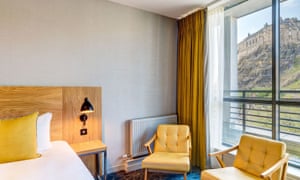 Bedroom with a view of Edinburgh Caste at Apex Grassmarket Hotel, Edinburgh, Scotland.
