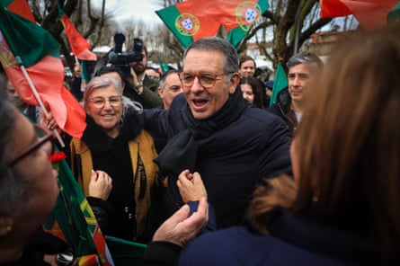 Man speaks to supporters.