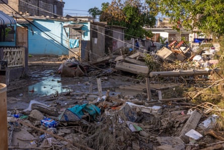 debris and damaged belongings fill street