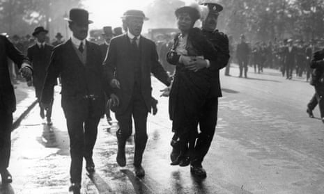 Emmeline Pankhurst is carried from a suffragette protest in 1914.