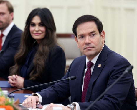 Marco Rubio sits next to Kimberly Guilfoyle
