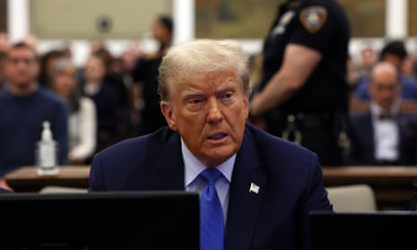 Donald Trump waits to take the witness stand during his civil fraud trial at the state supreme court Monday in New York, New York.