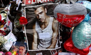 A photo of Liam Payne among floral tributes in Hyde Park, London