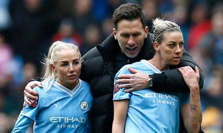 Gareth Taylor, pictured with Chloe Kelly and Alanna Kennedy.
