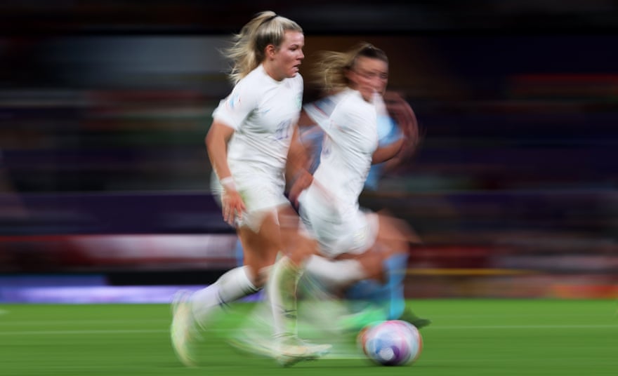 Lauren Hemp of England runs with the ball,