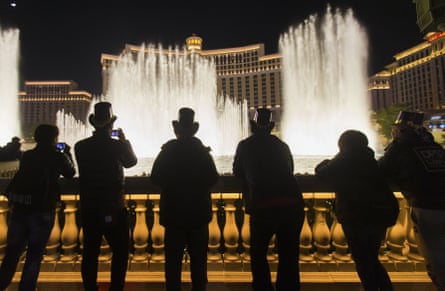 People gather to watch the Bellagio fountain show in Las Vegas on New Year’s Eve in 2019.