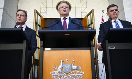 Australia’s health minister Greg Hunt, prime minister Scott Morrison and chief medical officer Brendan Murphy speak to the media in Canberra
