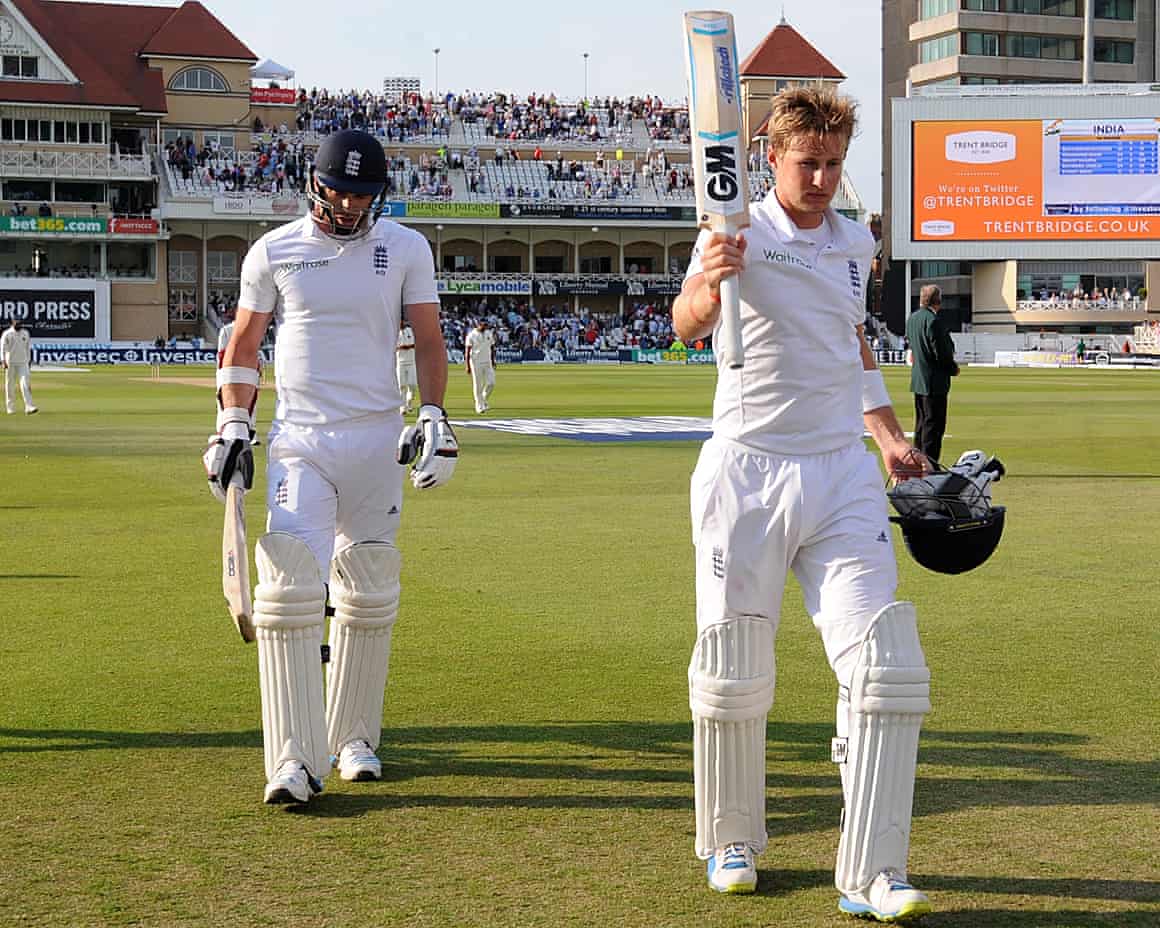 England’s James Anderson (left) and Joe Root walk back to the pavilion at Trent Bridge in 2014.
