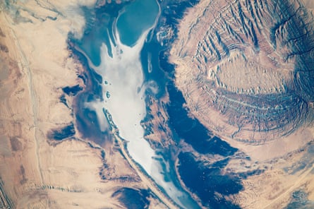 A crew member aboard the International Space Station took this photograph of a circular hill in the Kavir Desert in central Iran