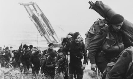 Royal Marine commandos moving off the Normandy Beaches during the advance inland from Sword beach.