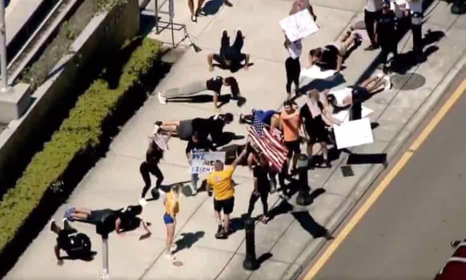 Gym-goers protest outside a courthouse in Florida.