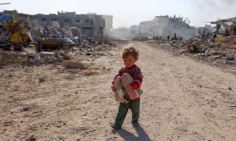 A displaced Palestinian child fleeing Beit Lahia in the northern Gaza Strip