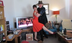 Chris Moss and his partner Kathryn Miller take tips from Youtube tango teachers in their living room in Totnes, Devon.