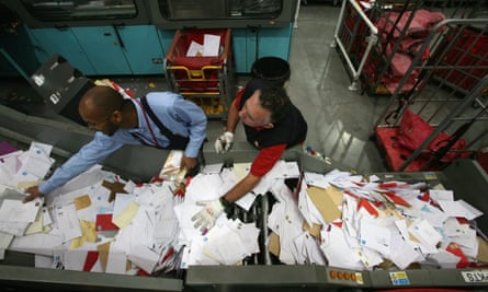 Royal Mail staff sort Christmas cards in the Filton sorting office, near Bristol.