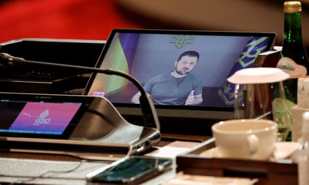 Ukraine’s president, Volodymyr Zelenskiy, addresses the G20 summit, in Nusa Dua, Bali, on Wednesday.