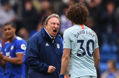 March 31: Cardiff manager Neil Warnock has words with Chelsea player David Luiz.