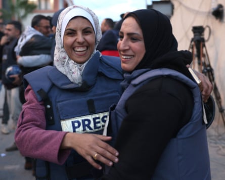 Dragga hugging another woman