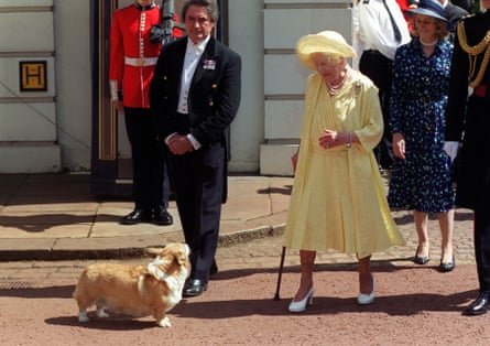 The Queen Mother with her pet corgi and butler William Tallon ‘backstairs Billy’on her 99th Birthday.