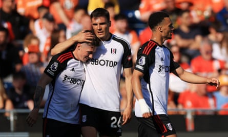 Harry Wilson (left) celebrates after scoring Fulham’s fourth goal.