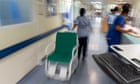 ‘Cuts will result in patient deaths’: hospitals shed medical staff after being told to balance the books