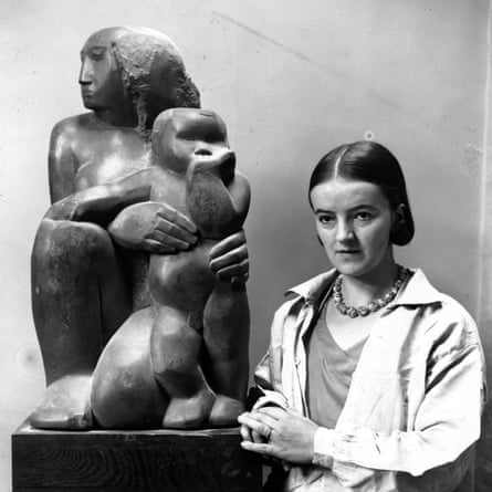 Barbara Hepworth with her sculpture Mother and Child.