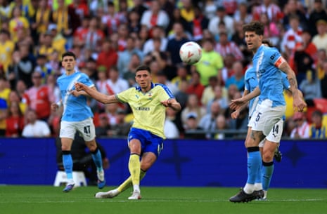 Southampton's Ross Stewart tries a curler.