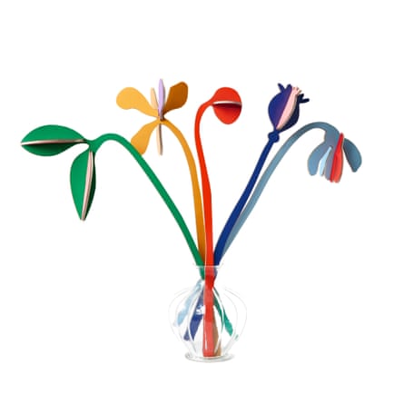 Colourful card flowers in a glass vase