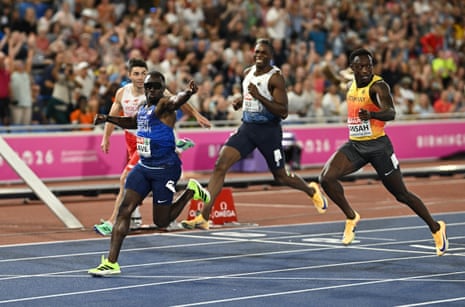 Great Britain’s Romell Glave celebrates winning the men’s 100m final.
