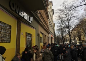 Shoppers queue outside Overkill in Berlin to get their hands on the limited edition trainers.