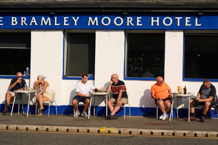 Drinkers at the Bramley Moore hotel, one of the few old pubs near Everton’s new Hill Dickinson stadium