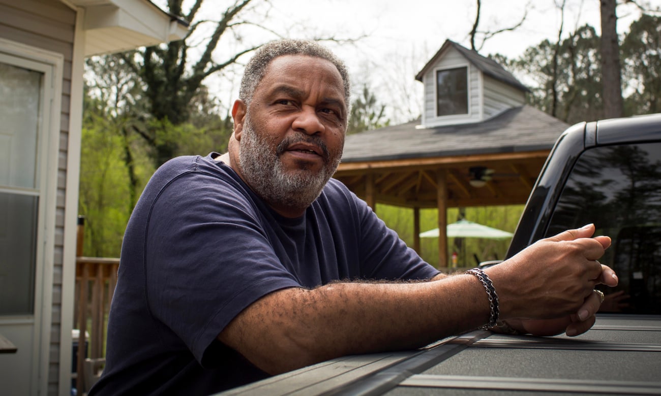 Anthony Ray Hinton standing next to his truck