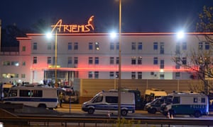 Police vans lined up outside the Artemis brothel in Berlin.